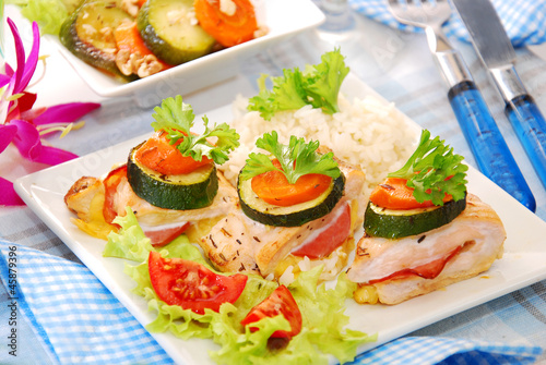 Photo: baked chicken breast filled with ham and cheese baked chicken breast filled with ham and cheese