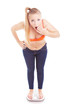Size 40 girl standing on a bathroom scale