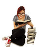 Photo: Pretty teenager girl sit on floor and reading book Pretty teenager girl sit on floor and reading book