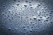 Waterdrops on a polished lacquer surface