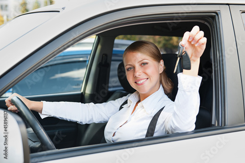 Photo: young woman sitting in car young woman sitting in car
