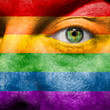 Rainbow Flag painted on face  to show gay pride support