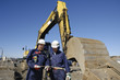bulldozer and construction workers