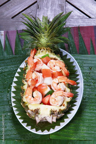 Photo: fresh seafood salad in pineapple. fresh seafood salad in pineapple.