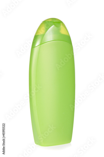 Photo: Shampoo bottle isolated on a white background Shampoo bottle isolated on a white background