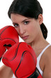 Tough woman with her boxing gloves