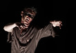 The  zombie  in browm shirt in the studio
