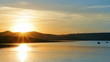 fisherman boats on morning lake with mountain