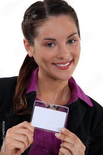 Photo: Brunette proudly displaying her business pass Brunette proudly displaying her business pass