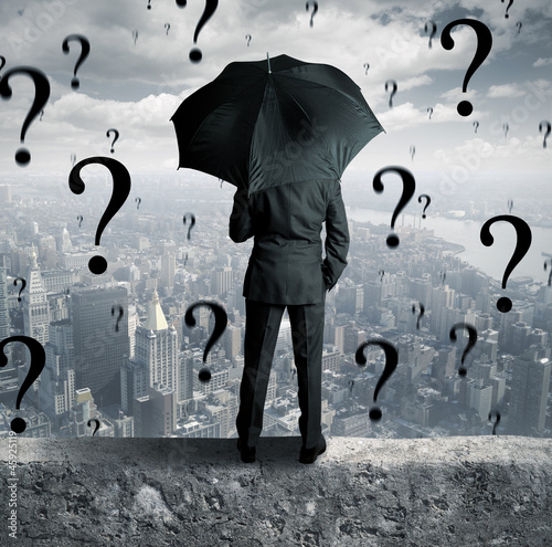 Photo: Businessman and questions Businessman and questions