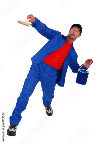 Photo: painter slipping and falling down painter slipping and falling down