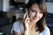Portrait of attractive woman talking on mobile phone