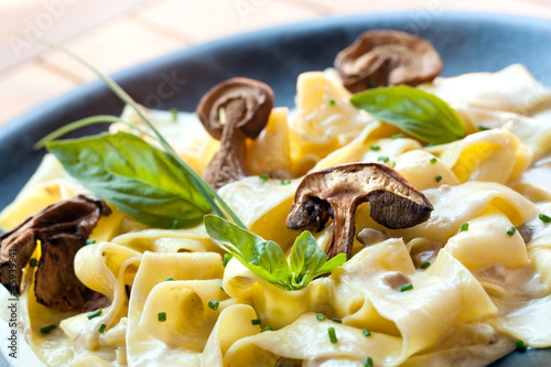 Photo: Close up of taggliatelle with funghi porcini. Close up of taggliatelle with funghi porcini.