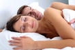 Foto: Closeup of couple sleeping in bed Closeup of couple sleeping in bed