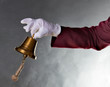 Hand mit der grossen Glocke
