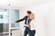 Photo: Young couple looking for real estate Young couple looking for real estate