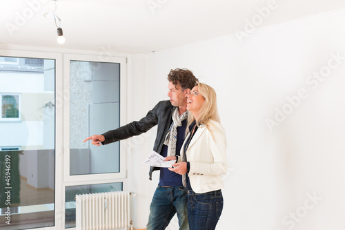 Photo: Young couple looking for real estate Young couple looking for real estate