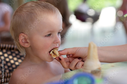Photo: Child eating pancake Child eating pancake