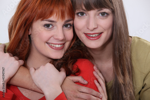 Photo: Mother and daughter hugging Mother and daughter hugging