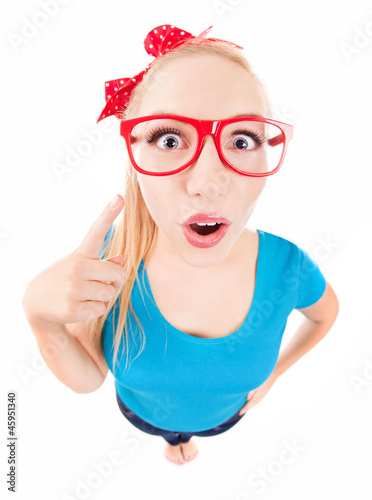 Photo: Brainstorm concept, funny girl is having an idea Brainstorm concept, funny girl is having an idea