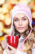 beautiful woman with red mug