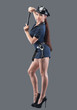 Woman in flirty police uniform, isolated on grey