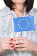 Woman holding an EU flag