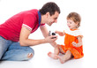 Little girl with her father in a studio