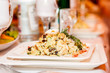 A salad with vegetables and meat