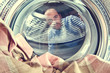 man and washing machine