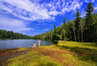 Photo: Wild beach on the shore of forest lake Wild beach on the shore of forest lake