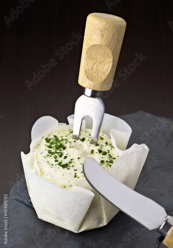 Photo: Spread cream cheese on stone base Spread cream cheese on stone base