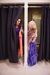Photo: Women standing in a changing room Women standing in a changing room