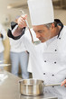 Chef tasting soup