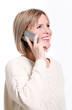 Caucasian middle aged woman on cellphone smiling