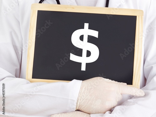 Photo: Doctor shows information on blackboard: dollar Doctor shows information on blackboard: dollar