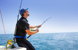 Foto: blue sea offshore fishing boat with fisherman blue sea offshore fishing boat with fisherman