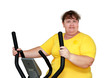 Foto: overweight woman exercising on trainer overweight woman exercising on trainer