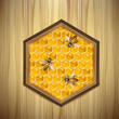 Bees and honeycombs over wood background