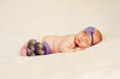 Newborn Baby Girl Wearing Legwarmers