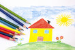 child drawing with pencils