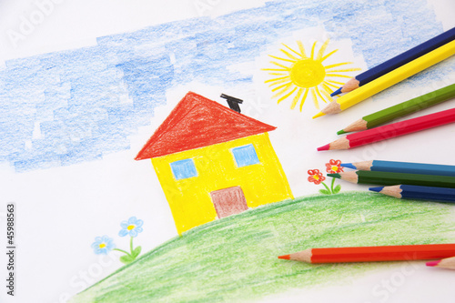 Photo: child drawing with pencils child drawing with pencils