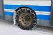 Snow winter chains on tyre of car