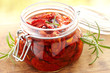Sun dried tomatoes with olive oil in a jar