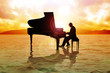 Stock image of a man silhouette playing piano on water