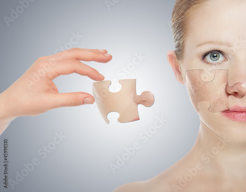 Photo: concept skincare with puzzles. Skin of beauty young woman before concept skincare with puzzles. Skin of beauty young woman before