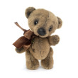Teddy bear in classic vintage style isolated on white background