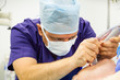 anesthesiologist performing tracheal intubation