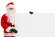 Santa Claus holding a blank sign