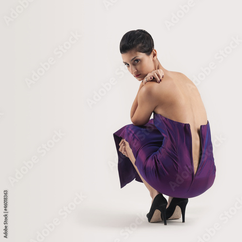 Photo: Portrait of beautiful brunette caucasian woman lying down. Portrait of beautiful brunette caucasian woman lying down.